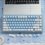 Lustrous premium ceramic Cinnamoroll keycaps with whimsical side-engraved art, showcasing soft vibrant colors for a playful, artistic keyboard.