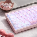 Close-up of artisanal My Melody ceramic keycaps, showcasing smooth pastel textures and charming character details from various angles.