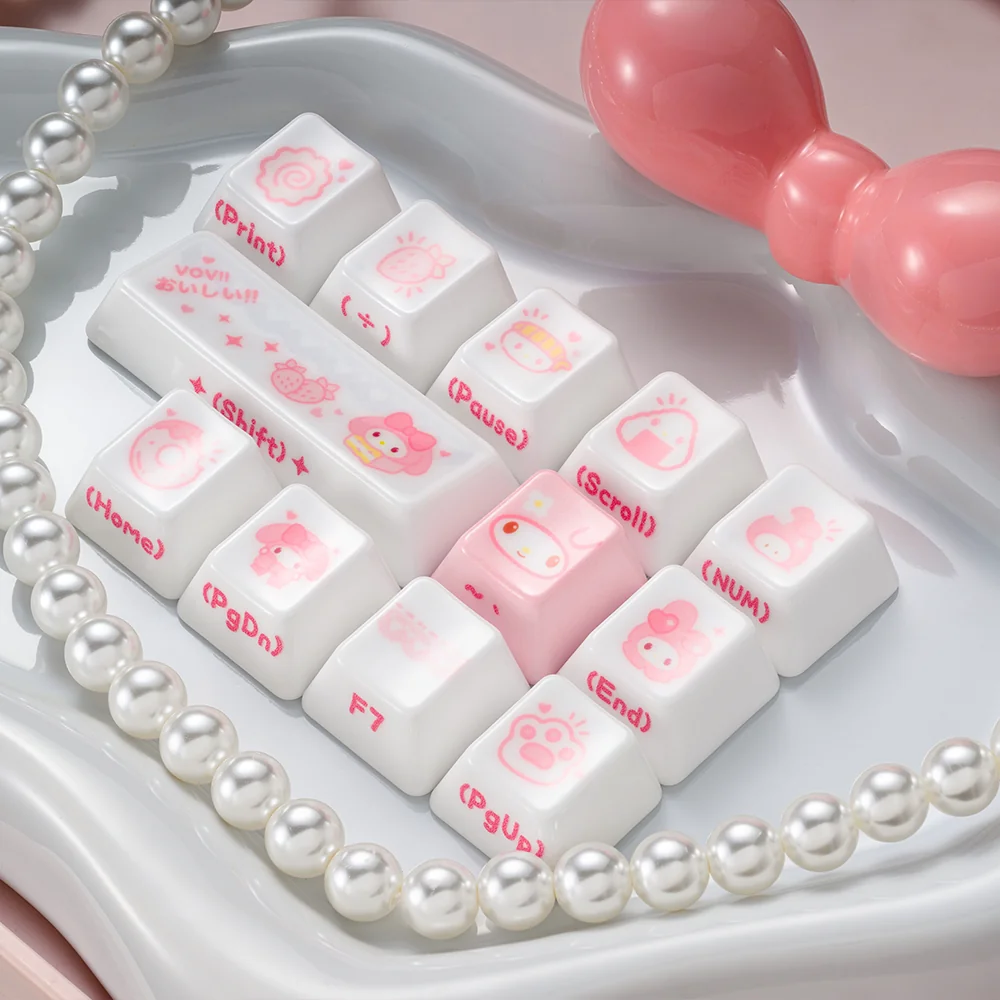 A delightful close-up of artisanal My Melody ceramic keycaps, showcasing their smooth texture, whimsical pastel hues, and adorable character designs.