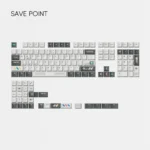 Angled view of the Save Point Cherry Keycap Set, showcasing the durable dye-sublimated pixel art legends. This artistic set evokes vintage computing aesthetics.