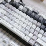 Serenade PBT Keycaps, Cherry profile, durable PBT, crisp five-sided dye-sub legends. Multiple angles reveal a tranquil, melodic aesthetic.