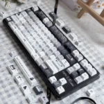 Serenade PBT Keycaps Set, showcasing durable PBT and crisp five-sided dye-sublimation in an Cherry profile for a tranquil, melodic keyboard aesthetic.