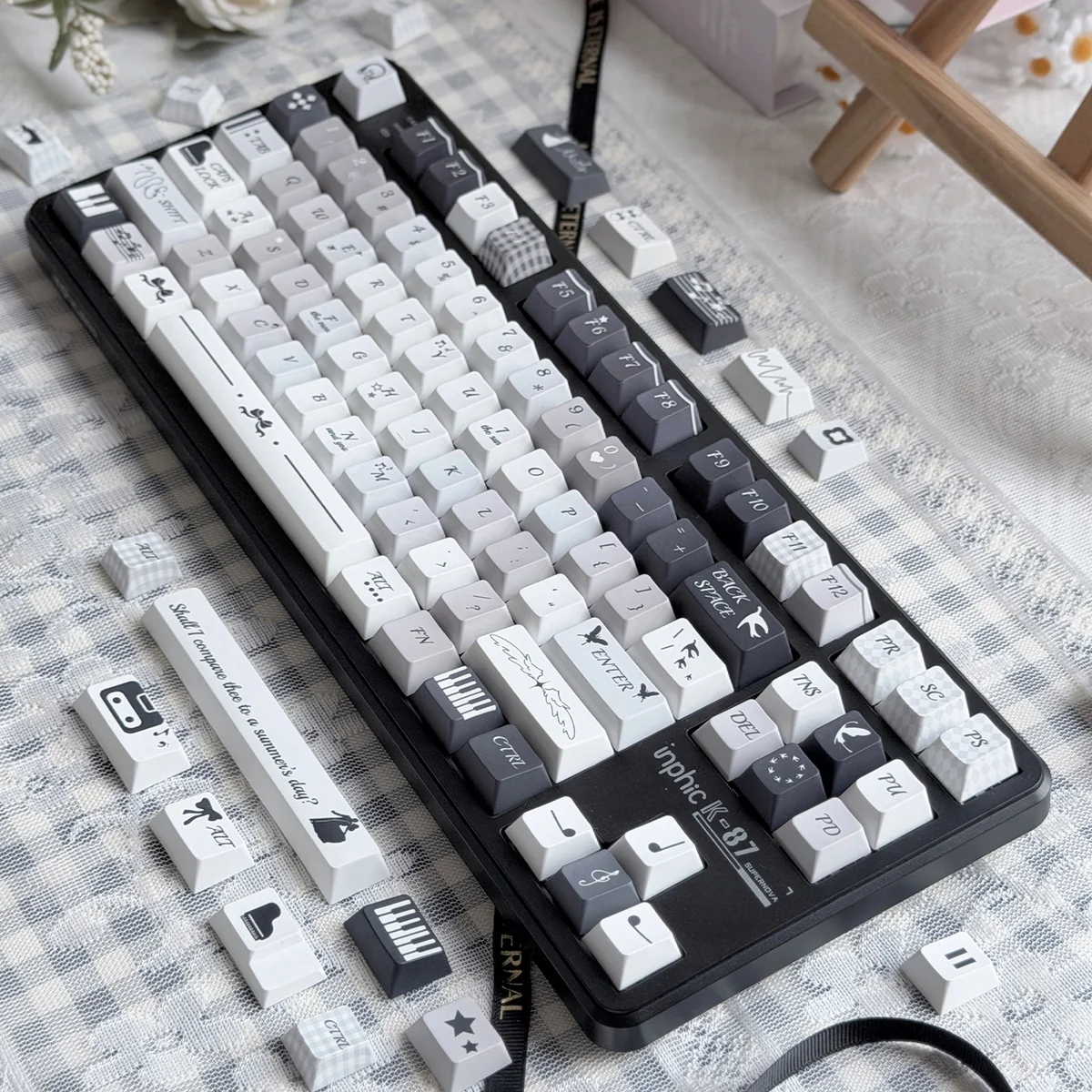 Serenade PBT Keycaps Set, showcasing durable PBT and crisp five-sided dye-sublimation in an Cherry profile for a tranquil, melodic keyboard aesthetic.