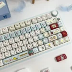 Detailed side view of the exclusive Snoopy PBT MOA keycap set, revealing vibrant dye-sub Peanuts art on each playful PBT keycap, evoking nostalgia.