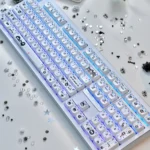 Handcrafted artisan Susuwatari keycap, showcasing a whimsical MAO expression delicately side-engraved.