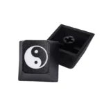 Gallery of the deep laser engraved Taiji PBT keycap, showcasing its harmonious Yin Yang artisan design from various elegant angles on durable PBT.