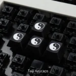 A close-up view of the exquisite Deep Laser Engraved Taiji PBT Keycap, showcasing the harmonious Yin Yang artisan design for a timeless.
