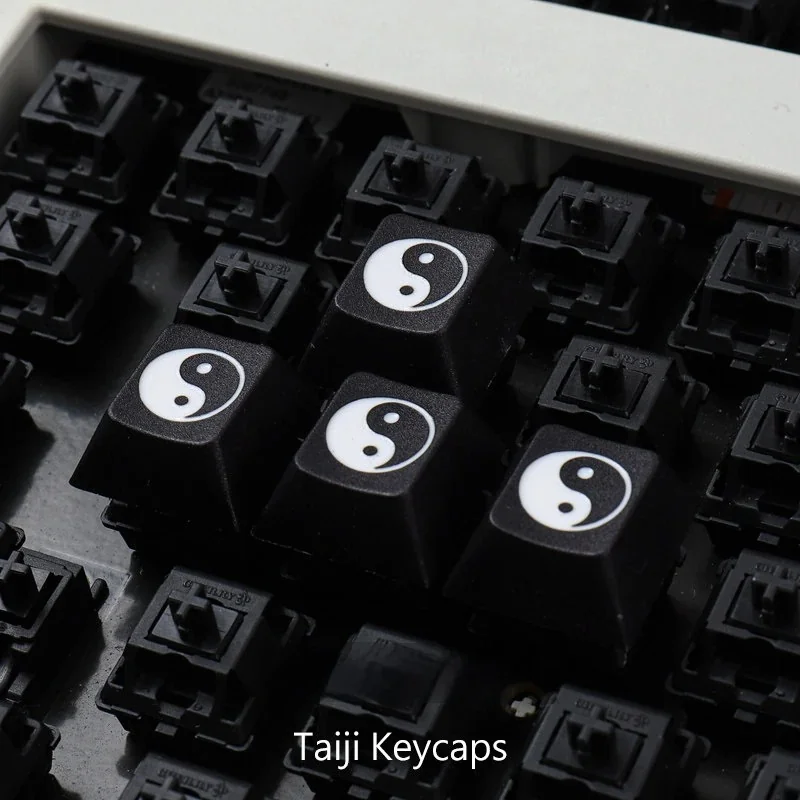 A close-up view of the exquisite Deep Laser Engraved Taiji PBT Keycap, showcasing the harmonious Yin Yang artisan design for a timeless.