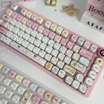 A close-up view of the vibrant, pixelated Tamagotchi PBT keycaps set, showcasing playful retro-tech designs and durable dye-sub legends for mechanical keyboard.