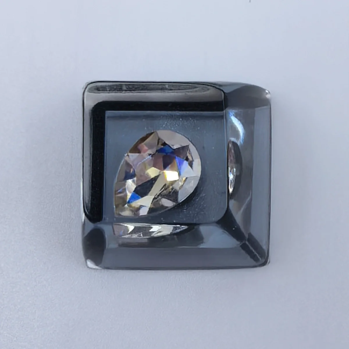 Delta Force Heart of Africa handcrafted resin keycap. Unique translucent epoxy ocean heart design in deep black and pure white, shown from multiple artistic design.