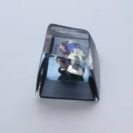Artistic Delta Force Heart of Africa handcrafted resin keycaps. Unique translucent epoxy ocean heart design in deep black and pure white, captured from various angle.