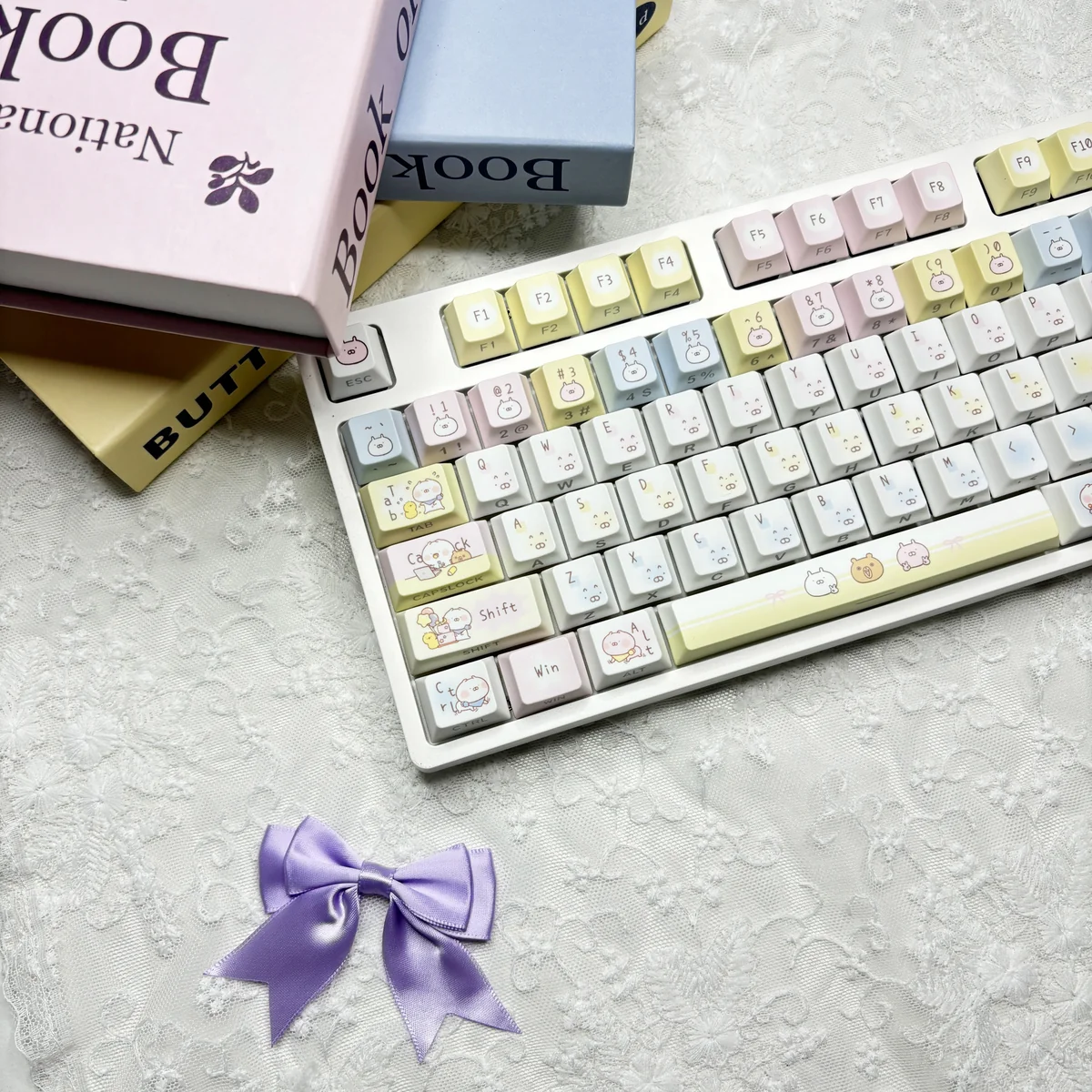 A delightful USAMARU keycap set shown from multiple angles, emphasizing the charming, whimsical rabbit designs and durable dye-sub PBT legends.