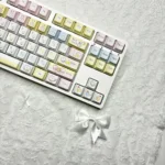 Close-up view of the delightful USAMARU keycap set, showcasing various adorable rabbit designs and the durable dye-sub PBT legends from multiple angles.