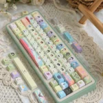 Pastel Color Valorant Cherry Keycap Set, showing vibrant ability and weapon designs from playful angles, enhancing gaming immersion.