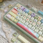 Pastel Color Valorant Cherry Keycap Set from multiple angles, detailing iconic character abilities and weapon designs for playful gaming immersion.