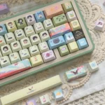 Pastel Color Valorant Cherry Keycap Set from multiple angles, displaying vibrant game aesthetics, iconic character abilities, and weapon designs.