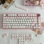Close-up of the enchanting Whimsical Wishing Bottle Pink MOA Keycap Set, showcasing adorable pink hues and magical wishing bottle designs.