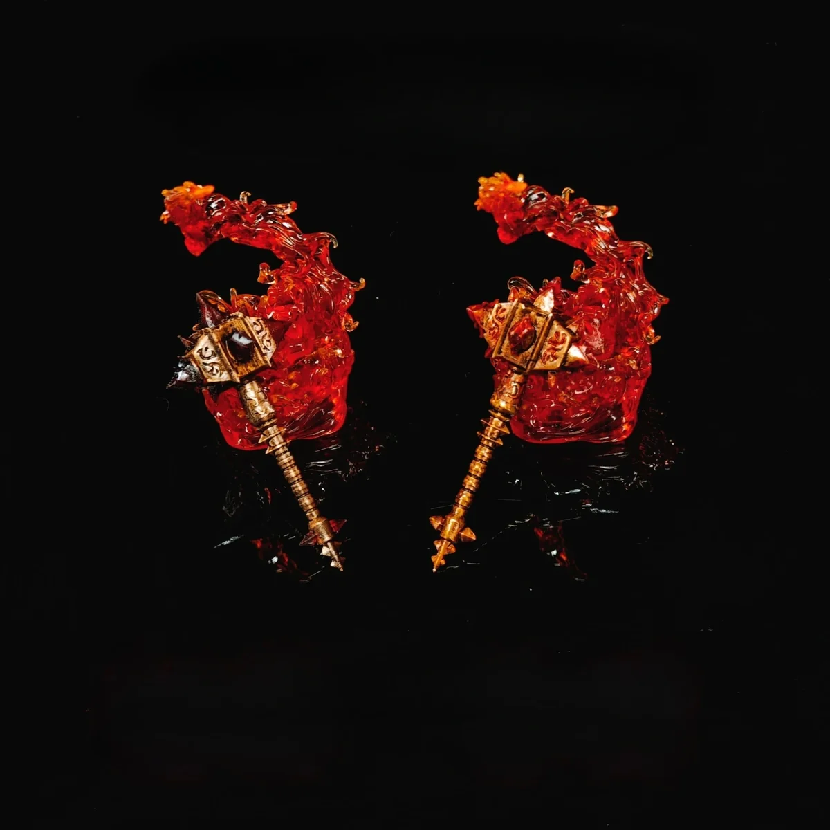 Iconic World of Warcraft Sulfuras, Hand of Ragnaros Keycap: an artisan Ragnaros weapon, showcasing majestic metal and vibrant fiery resin from a premium angle.