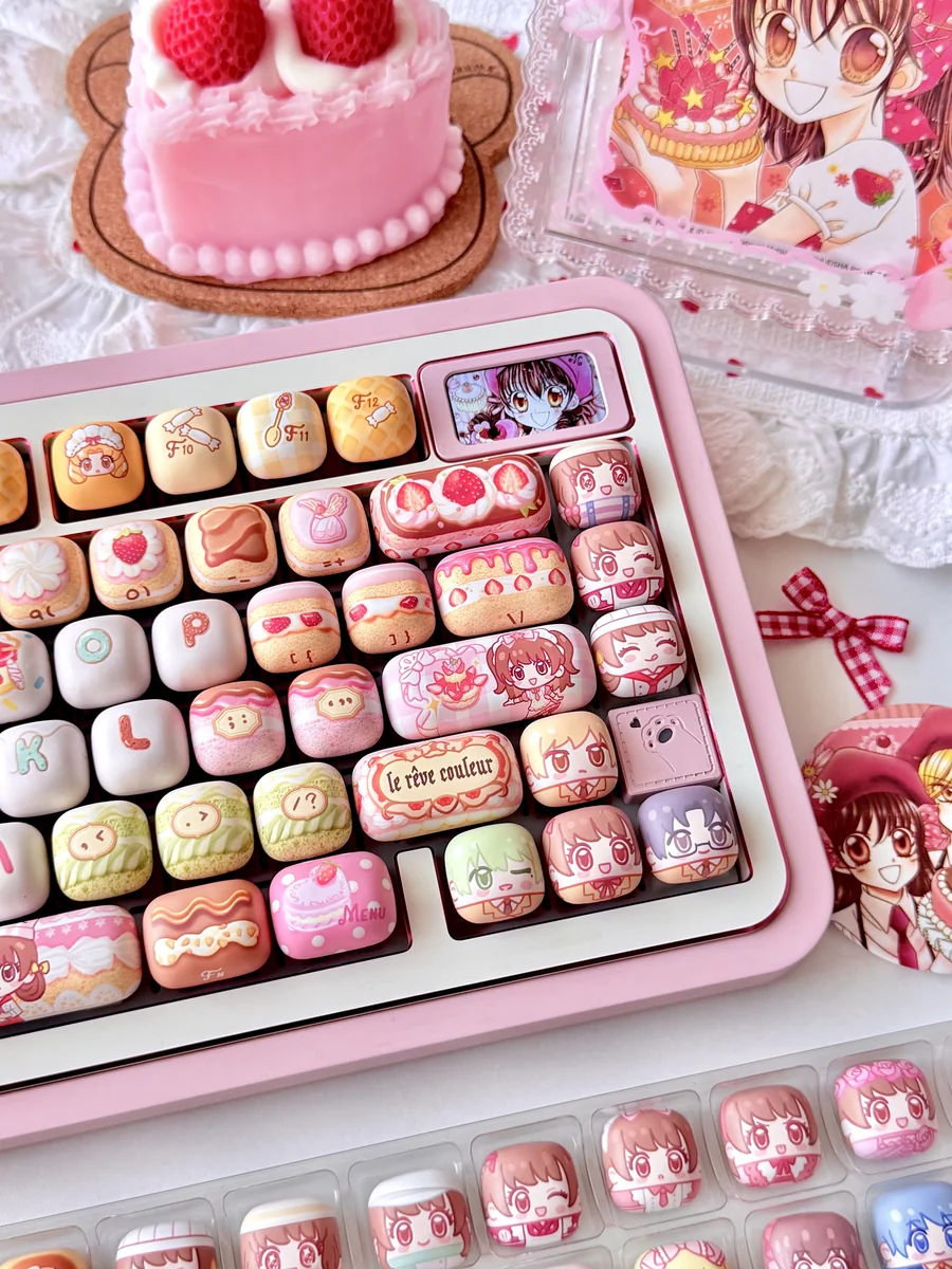 Close-up of Yumeiro Patissiere keycaps, showcasing sweet anime characters and pastel dessert designs from various angles in this exclusive PBT set.