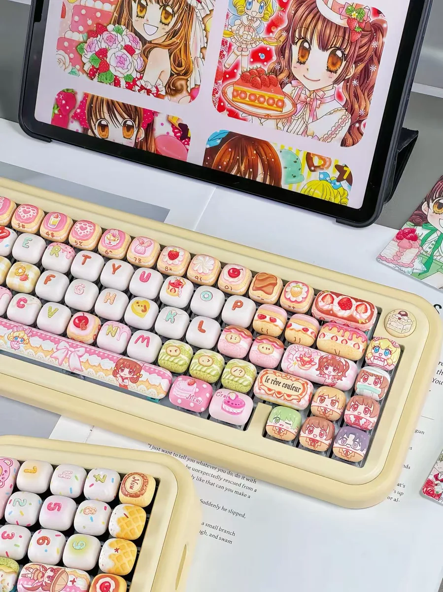 Delightful close-up of exclusive Yumeiro Patissiere PBT keycaps, revealing intricate pastel dessert art and adorable anime characters for a sweet keycap/