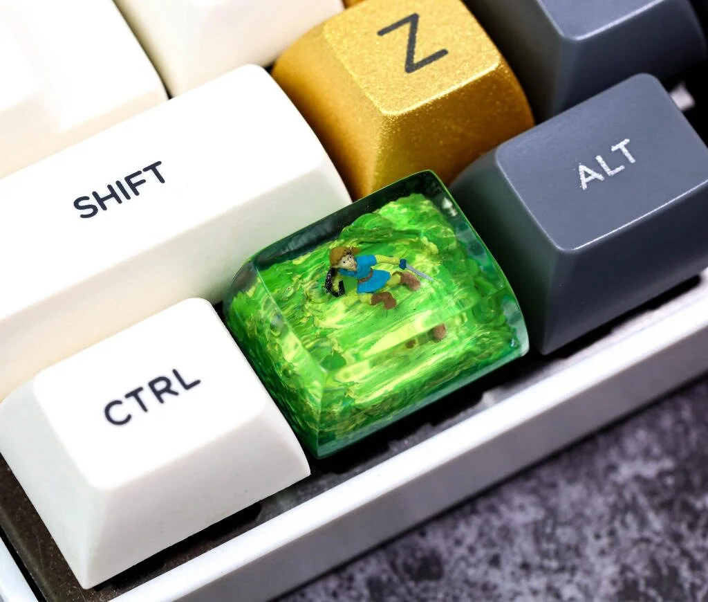 The Legend of Zelda: Link Transparent Keycap featuring Link, the Master Sword, and other Hyrule artifacts in stunning, vibrant detail, perfect for collect.