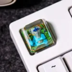Close-up of a premium handcrafted The Legend of Zelda: Chibi Ver. Master Sword Transparent Keycap, showcasing its intricately sculpted 3D design in translucent resin with vibrant backlit illumination.
