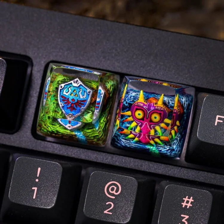 Detailed gallery views of the premium handcrafted Zelda Majora's Mask keycap, highlighting its intricate sculptural design.