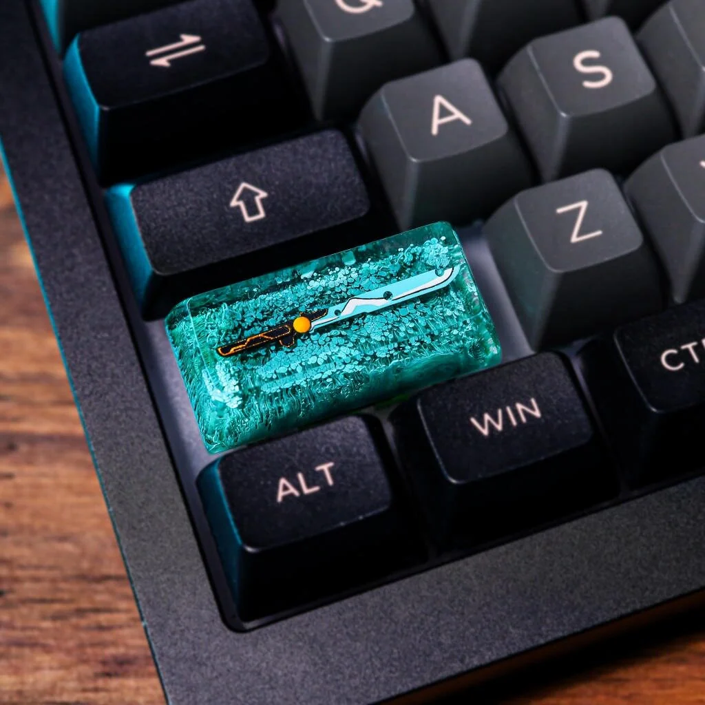 Close-up of a handcrafted, The Legend of Zelda: Guardian Sword Transparent Keycap, showcasing its intricate 3D sculpted design and vibrant glow, a premium artisan collection.