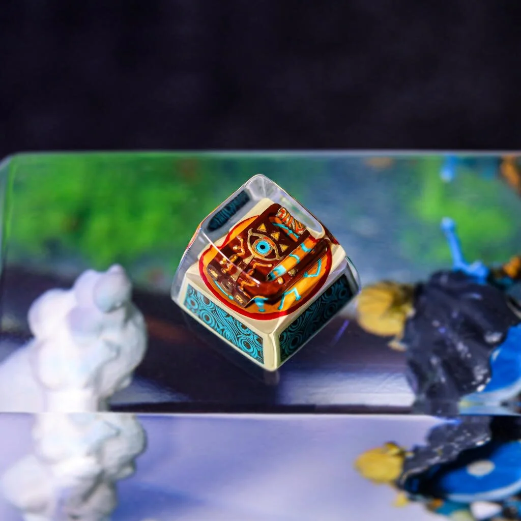 Detailed view of the handcrafted The Legend of Zelda: Sheikah Transparent Keycap, highlighting its mystical glowing Hyrule art and 3D sculpted ancient Sheikah.