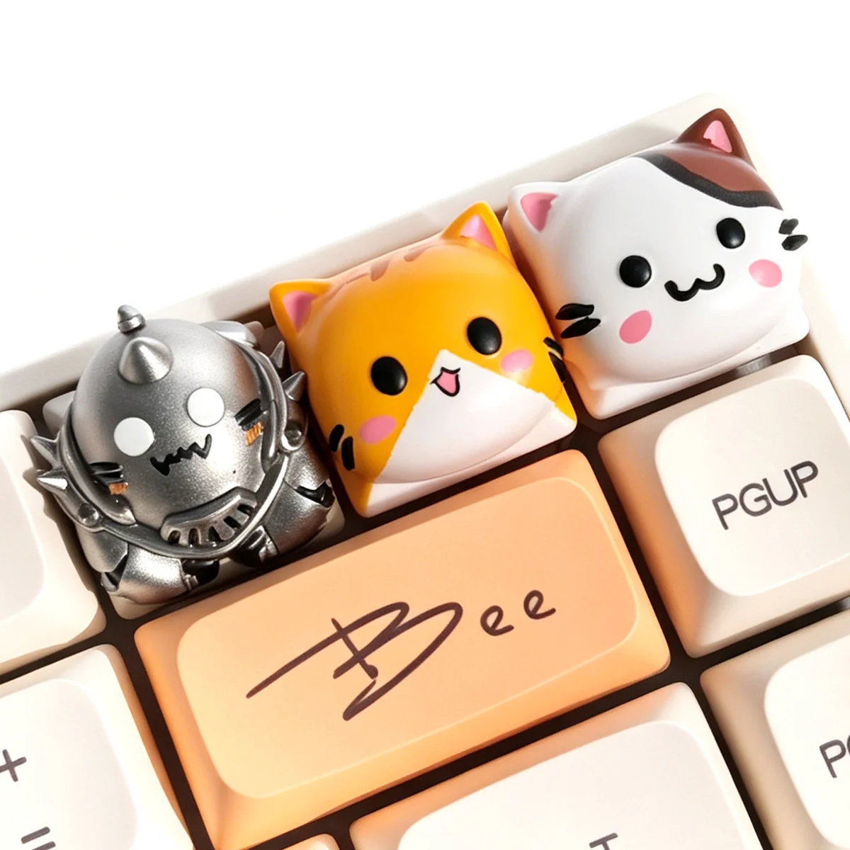 Detailed close-up of the exclusive Alphonse Elric cat artisan keycap, revealing intricate resin sculpting and adorable anime-inspired details.