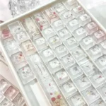 Artisan Rose Keycap Set: Frosted crystalline rose motif, translucent PC, carbon texture. Angles show personalized elegance for mechanical keyboards.