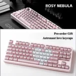 Detailed view of Astronaut XDA keycaps, showcasing translucent PBT+PC construction with crisp cosmic astronaut and nebula legends from an artistic angle.