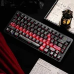 Black-Red Carbon Fiber keycaps with side-printed backlit legends and sharp red accents, showcasing the premium Cherry set from multiple angles.