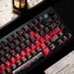 Close-up views of premium Black-Red Carbon Fiber Keycaps, showcasing their sleek black texture, sharp red accents, and illuminated side-printed backlit legends.