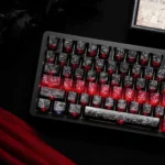 A collection of sleek carbon fiber keycaps with side-printed backlit legends and sharp red accents, showcased from multiple premium angles.