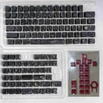A gallery of Black-Red Carbon Fiber keycaps, showcasing their side-printed backlit legends and sharp red accents from various angles.