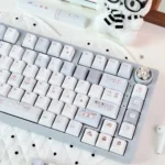 Whimsical Blue Bear Bake PBT Dye-Sub Cherry keycap set, displaying charming bear and bakery motifs in cozy blue hues across various keys.