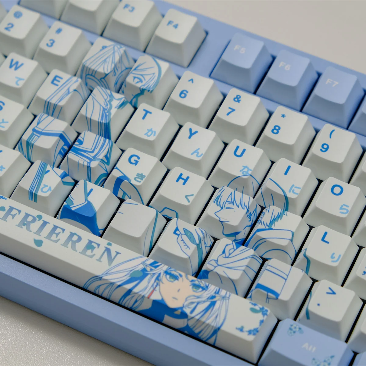 Frieren: Beyond Journey's End keycaps set, featuring vibrant, meticulously crafted iconic characters and symbols.
