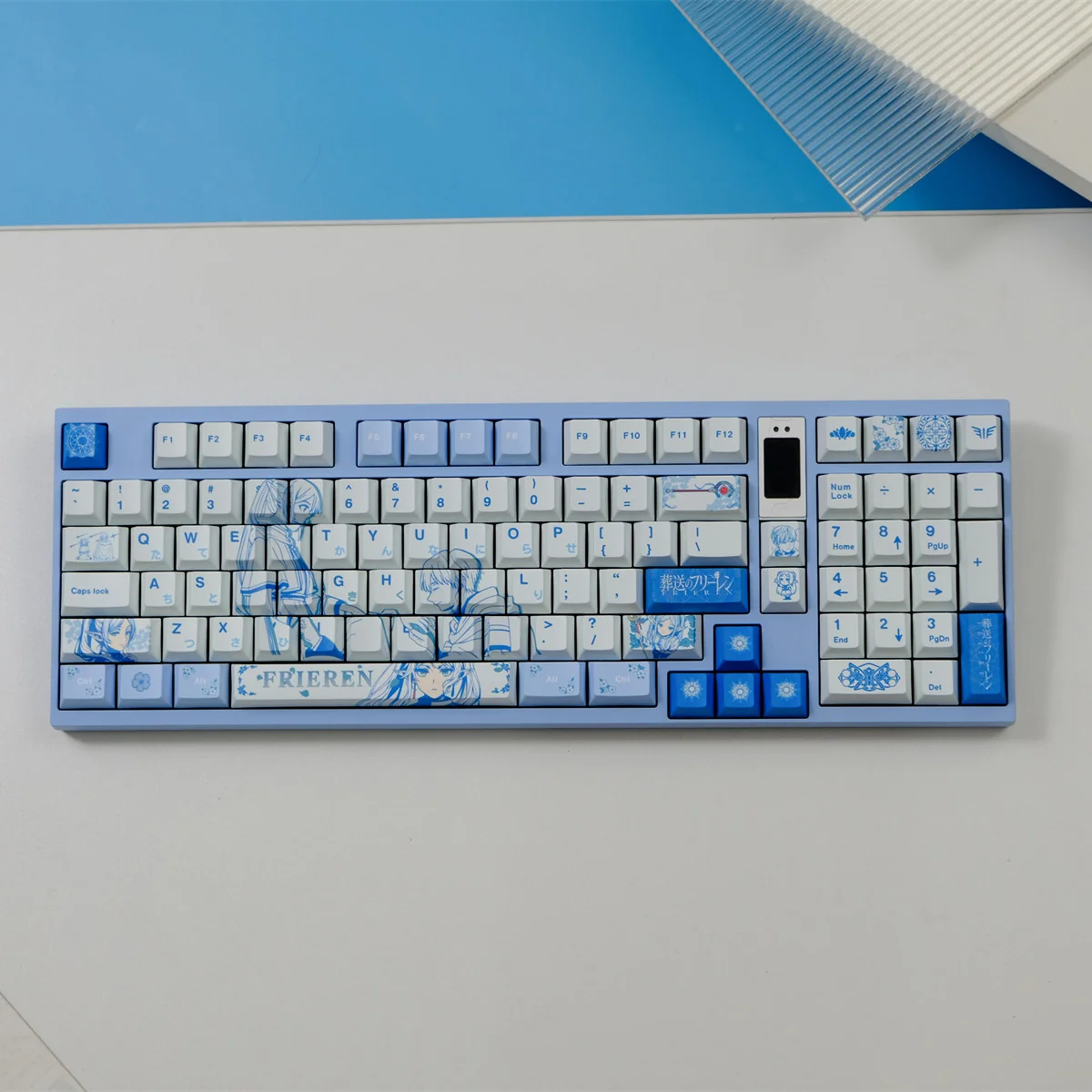 Frieren: Beyond Journey's End keycap set, showcasing iconic characters with vibrant, meticulously crafted details for a premium keyboard.