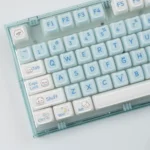 A gallery of adorable translucent Kitten Crystal Jelly MAO keycaps, showcasing their whimsical iridescent design and playful charm from multiple angles.