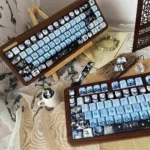 Ethereal Blue Mist PBT Dye-Sub Keycap Set from a unique angle, revealing dreamy blue hues and subtle reflections, an artistic keyboard accessory.