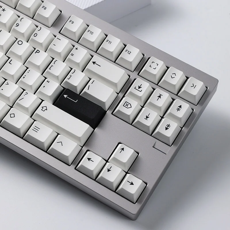 BOW Pure White Cherry Keycap Set: Timeless pure white PBT dye-sub Cherry profile set, showcasing crisp legends and minimalist elegance from multiple angles.