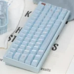 Brocade Of Drifting Light Cherry Keycap Set: shimmering pearlescent colors, durable anti-fade characters, luxurious light play all angles.
