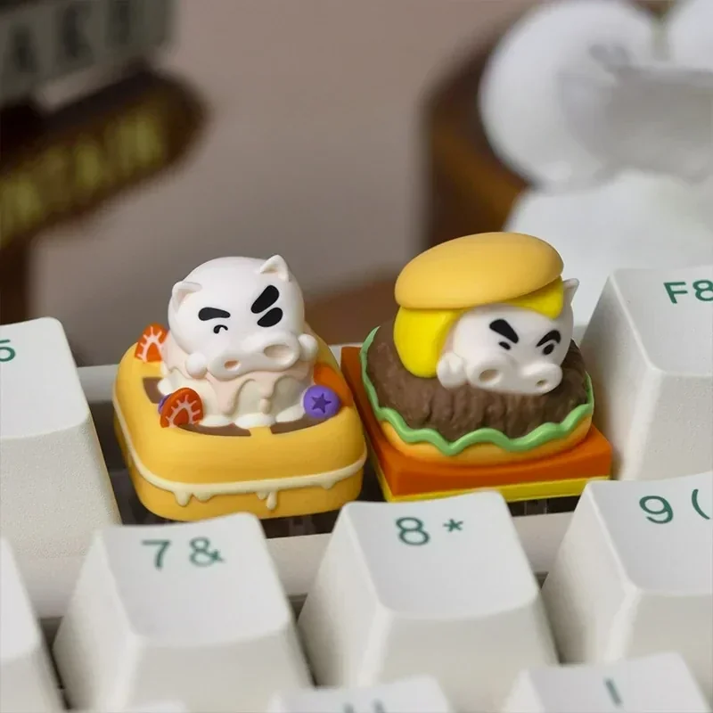 A whimsical, collectible Buriburizaemon Keycap featuring Crayon Shin-Chan as a delightful burger, showcasing its playful artisan design.