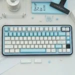 Butterfly Lovers Keycaps featuring a shimmering pearlescent butterfly design with iridescent blue-white hues, highlighting delicate artistry.