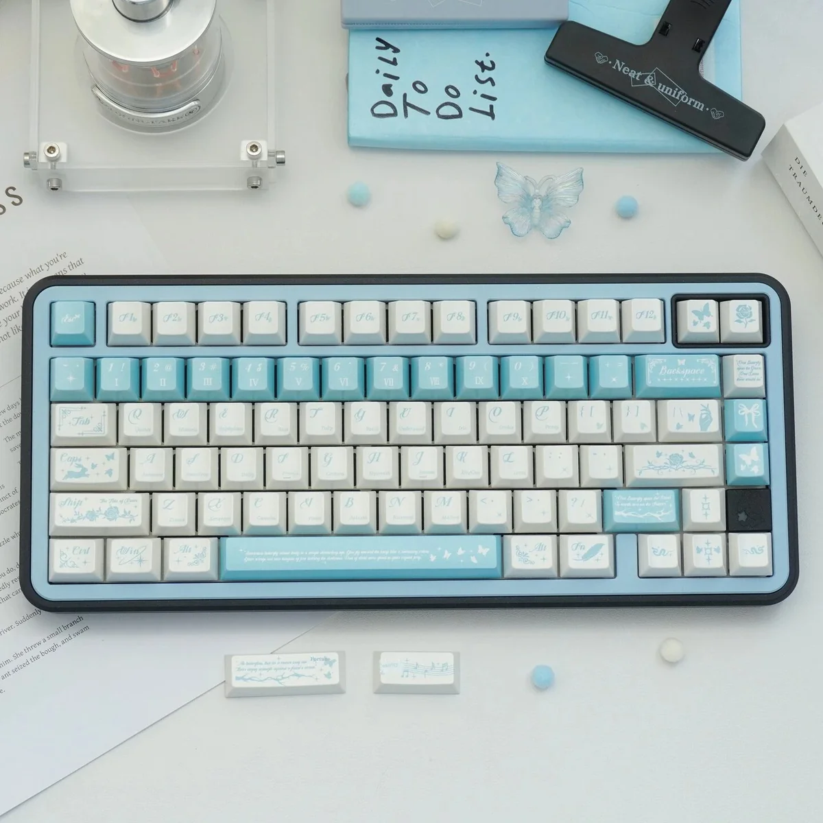 Butterfly Lovers Keycaps featuring a shimmering pearlescent butterfly design with iridescent blue-white hues, highlighting delicate artistry.