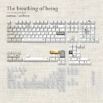 Main display of the premium Camus The Breathing Of Being Keycaps Set, highlighting its unique gilded characters and elegant.