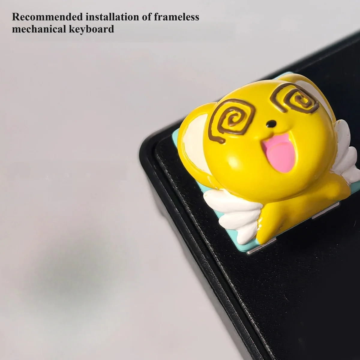 Handcrafted Cardcaptor Sakura Cerberus resin keycap, showcasing its vibrant Cerberus character and intricate artisan sculpting from a unique angle.