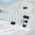 Close-up of the Whimsical Cat Baker PBT Dye-Sub Keycap Set, showcasing charming feline bakers in pastel kitchen scenes from various angles.