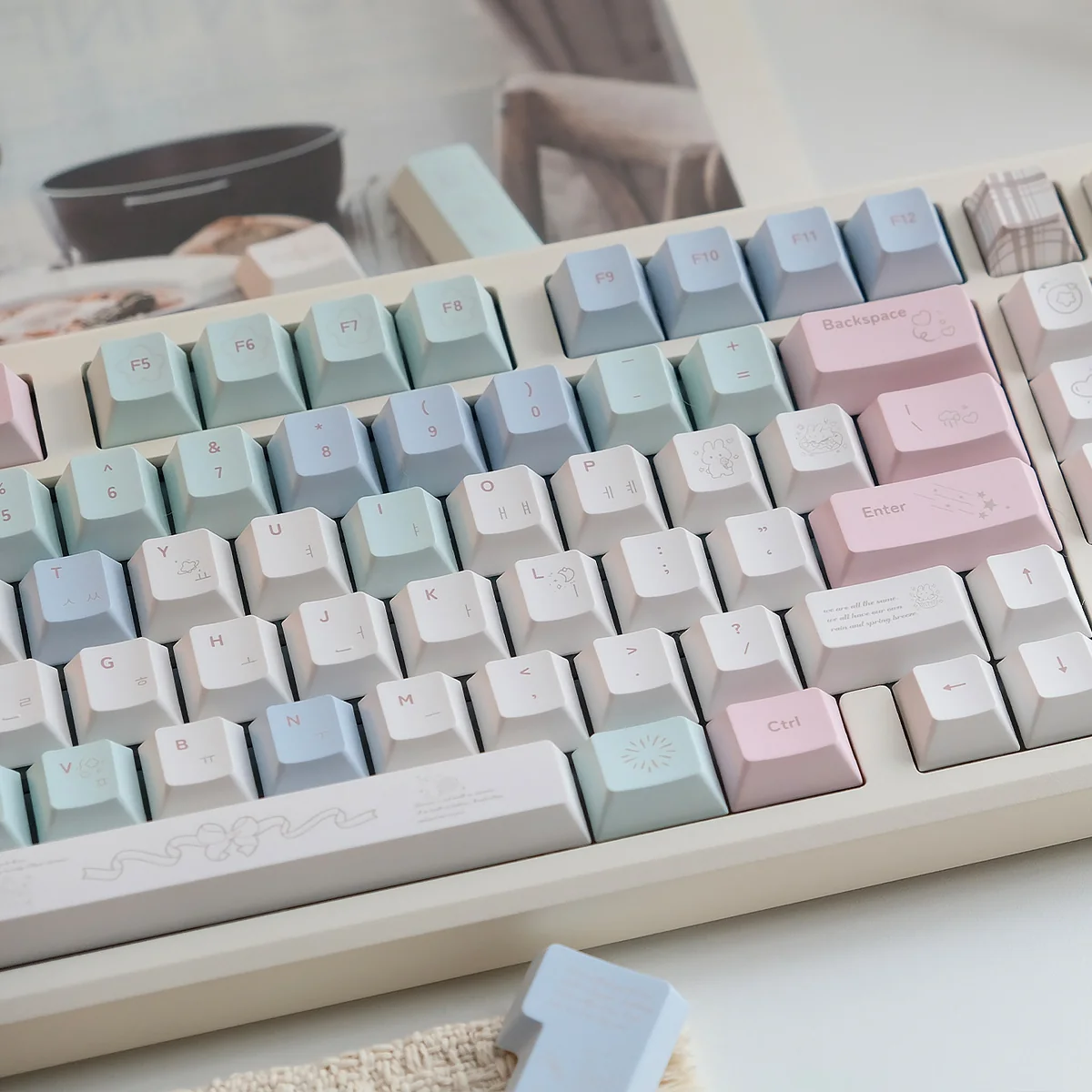 Playful Cheese Bunny PBT+PC MOA keycaps are shown from multiple angles, emphasizing their whimsical rabbit and cheese design and durability.